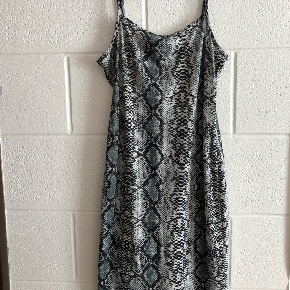 Tight snakeskin mini dress
